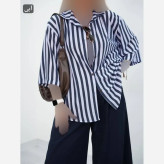 ست تاپ شلوارک زنانه ویسکوز فلامنت فول کش رنگ طلایی فری سایز