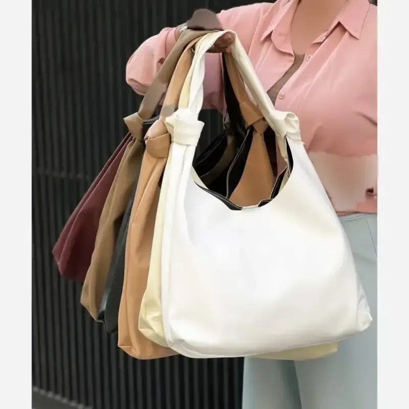 کیف زنانه شرانگ خارجی بند گره به همراه کیف آرایش سایز 33-38